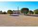 Large backyard with gravel and mature desert landscaping at 20619 N Echo Mesa Dr, Sun City West, AZ 85375