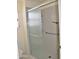 Walk-in shower with grab bars and built-in shelving at 20619 N Echo Mesa Dr, Sun City West, AZ 85375