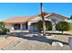 Single story home with red tile roof and mature landscaping at 20619 N Echo Mesa Dr, Sun City West, AZ 85375