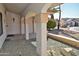 Covered front porch area offering a relaxing outdoor space at 20619 N Echo Mesa Dr, Sun City West, AZ 85375