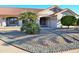 Landscaped front yard with gravel and drought-tolerant plants at 20619 N Echo Mesa Dr, Sun City West, AZ 85375