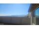 View of backyard with block wall and mountain views at 20829 N 223Rd Ave, Surprise, AZ 85387