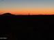 Sunset over desert landscape, showing mountains in the distance at 221 E Nebraska St, Florence, AZ 85132