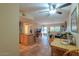 Open living room with view to kitchen and dining area at 221 E Nebraska St, Florence, AZ 85132