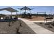 Playground and picnic area with shade structure at 24151 W Hidalgo Ave, Buckeye, AZ 85326