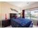 Cozy bedroom with a comfortable bed and ample natural light at 2425 W Bronco Butte Trl # 2037, Phoenix, AZ 85085