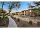 Apartment community with landscaped grounds and walkways at 2425 W Bronco Butte Trl # 2037, Phoenix, AZ 85085