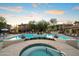 Inviting community pool and spa with plenty of lounge space at 2425 W Bronco Butte Trl # 2037, Phoenix, AZ 85085