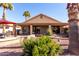 Home exterior view with a large backyard and patio area at 25046 S Foxglenn Dr, Sun Lakes, AZ 85248