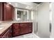 Bathroom with granite vanity, large mirror and walk-in shower at 25046 S Foxglenn Dr, Sun Lakes, AZ 85248