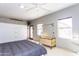 Finished garage includes a murphy bed, storage unit, and exterior access door, providing versatility at 25046 S Foxglenn Dr, Sun Lakes, AZ 85248