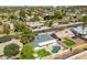 Neighborhood aerial view featuring a fenced yard, lush lawn, and refreshing pool at 2818 S Cottonwood Dr, Tempe, AZ 85282