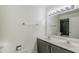 Bright bathroom with double vanity and mirrored medicine cabinet at 2818 S Cottonwood Dr, Tempe, AZ 85282