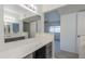 Main bathroom features a double vanity and a view of bedroom at 2818 S Cottonwood Dr, Tempe, AZ 85282