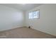 Simple bedroom with neutral walls and carpet flooring at 2818 S Cottonwood Dr, Tempe, AZ 85282