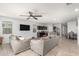 Open concept living space with a view of the kitchen and dining area at 3224 N Lainey Ln, Buckeye, AZ 85396