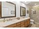 Bathroom boasts double sinks and a walk-in shower at 34476 N 68Th Way, Scottsdale, AZ 85266