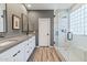 Modern bathroom with double sinks and a large shower at 34476 N 68Th Way, Scottsdale, AZ 85266