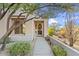 Inviting home exterior with a landscaped walkway leading to the entrance at 34476 N 68Th Way, Scottsdale, AZ 85266