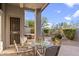 Spacious patio with a hot tub and seating for outdoor dining at 34476 N 68Th Way, Scottsdale, AZ 85266