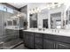 Spa-like bathroom with double vanity, large shower, and modern tile at 36038 N Puente Alto Ave, Queen Creek, AZ 85140