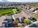 Wonderful aerial view of home with a swimming pool and community park nearby at 3933 E Alfalfa Dr, Gilbert, AZ 85298