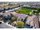 Wonderful aerial view of home with a swimming pool and community park nearby at 3933 E Alfalfa Dr, Gilbert, AZ 85298