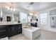 Bright bathroom features a soaking tub and double sinks at 3933 E Alfalfa Dr, Gilbert, AZ 85298