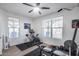 Bright home gym with natural light and specialized equipment offers the perfect space for daily workouts and fitness goals at 3933 E Alfalfa Dr, Gilbert, AZ 85298