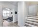 Inviting home gym near the stairs features a ceiling fan, natural light, and room for the Gathering to stay fit at 3933 E Alfalfa Dr, Gilbert, AZ 85298