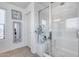 Bright shower with a glass door and tiled walls at 3933 E Alfalfa Dr, Gilbert, AZ 85298