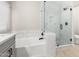 Spa-like bathroom with soaking tub, walk-in shower, and marble finishes at 4041 E Lexington Ave, Gilbert, AZ 85234