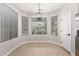 Bright dining area with bay windows and light wood flooring at 4041 E Lexington Ave, Gilbert, AZ 85234