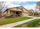 House exterior showcasing a well-maintained lawn and a two-car garage at 4041 E Lexington Ave, Gilbert, AZ 85234