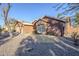 Single story home with a two car garage, and mature trees at 4056 E Rosemonte Dr, Phoenix, AZ 85050