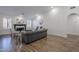 Living room with hardwood floors, fireplace, and large windows at 4056 E Rosemonte Dr, Phoenix, AZ 85050