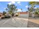 Single story home with attached garage and landscaped front yard at 4079 E Yucca St, Phoenix, AZ 85028