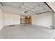 Attached garage with open shelving and concrete floor at 4079 E Yucca St, Phoenix, AZ 85028