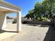 Covered patio and gravel backyard at 42025 W Manderas Ln, Maricopa, AZ 85138