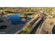 Aerial view of a neighborhood and community pond area at 4229 E Crest Ct, Gilbert, AZ 85298