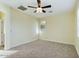 Bright bedroom with carpeted floors and ceiling fan at 4229 E Crest Ct, Gilbert, AZ 85298