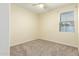 Bedroom with neutral walls, carpet, a ceiling fan, and a window for natural light at 4229 E Crest Ct, Gilbert, AZ 85298