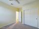 Bedroom with ceiling fan and sliding door to closet at 4229 E Crest Ct, Gilbert, AZ 85298