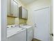 Laundry room with upper cabinets and washer/dryer hookups at 4229 E Crest Ct, Gilbert, AZ 85298