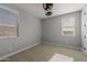 Simple bedroom with neutral walls and carpet at 4257 E John St, Gilbert, AZ 85295