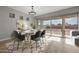 Bright dining room with table, chairs and view to backyard at 4257 E John St, Gilbert, AZ 85295