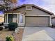 One-story house with attached garage and desert landscaping at 42659 W Sunland Dr, Maricopa, AZ 85138