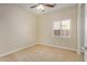 Bedroom with ceiling fan and window at 42788 W Martie Lynn Rd, Maricopa, AZ 85138