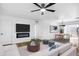 Bright living room featuring a modern fireplace at 4607 E Park St, Phoenix, AZ 85042