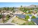 House with a pool and driveway, aerial view at 4728 E Mulberry Dr, Phoenix, AZ 85018